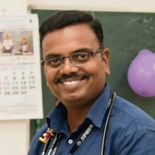 Dr. Adhisivam B